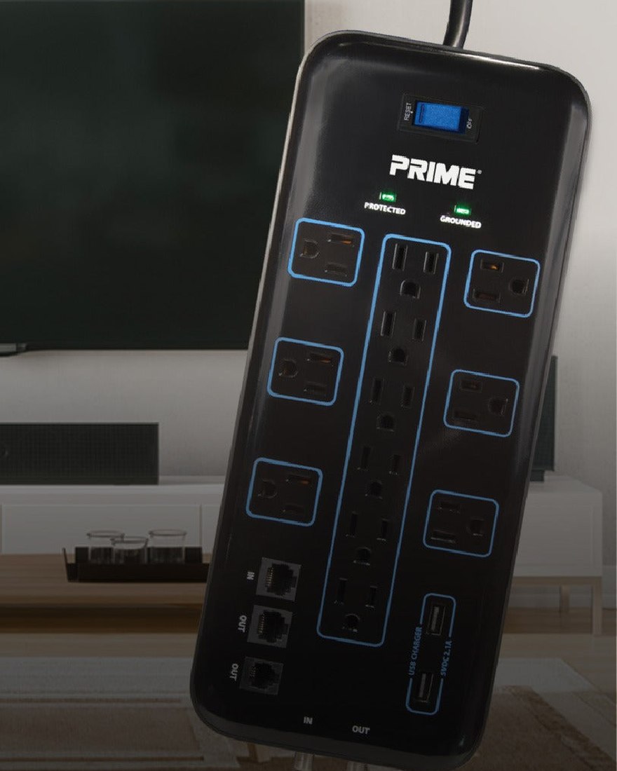 A Prime surge protector beside a television in a living room
